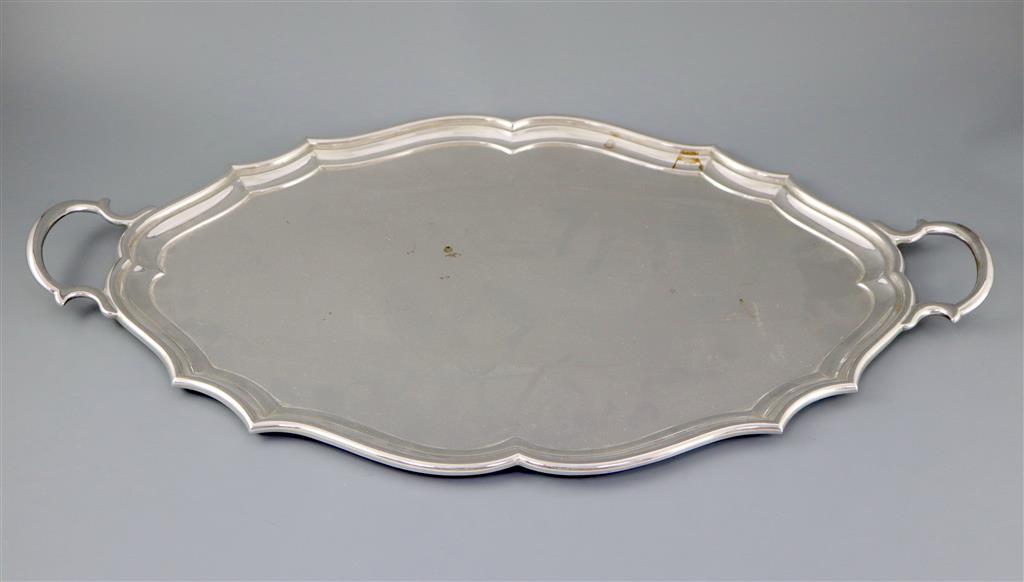 A George V silver shaped oval two handled tea tray, by Henry Stratford Ltd,